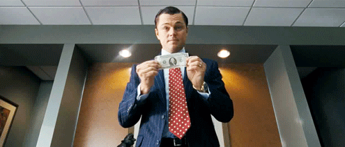 jordan-belfort-throws-out-money-the-wolf-of-wall-street.gif